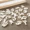 6 Packs: 140 ct. (840 total) 1.5&#x22; Punch Cut Wood Script Letters by Make Market&#xAE;